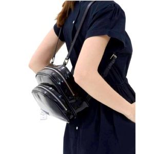 NWT PATENT LEATHER CLASSY BACKBACK!